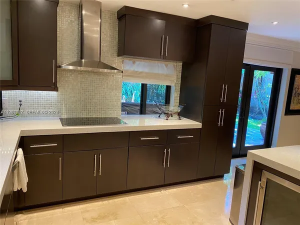 a bathroom with a double vanity sink and mirror