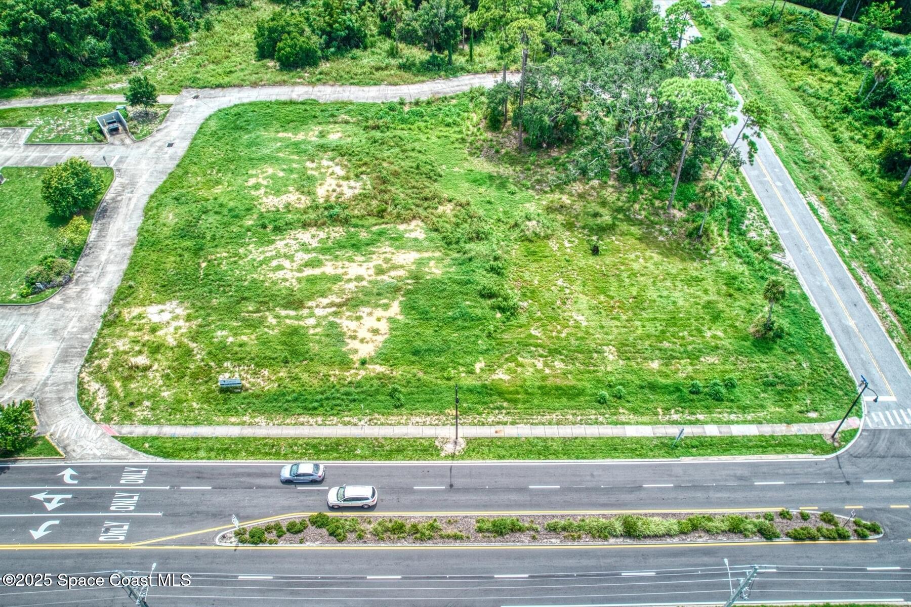 151 Eyster Boulevard Rockledge, FL 32955 - Photo 14 of 15 a view of a garden with a bench