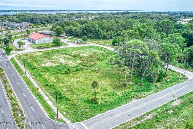 a view of a yard with an outdoor seating