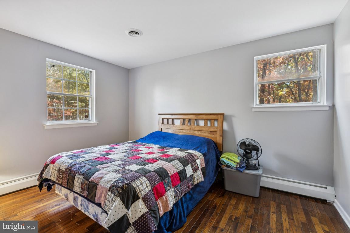 207 Sooy Place Road Tabernacle, NJ 08088 - Photo 12 of 25 a bedroom with a bed and a window