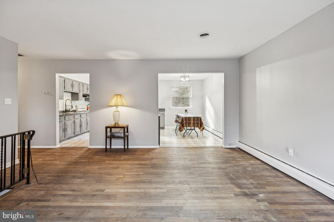 207 Sooy Place Road Tabernacle, NJ 08088 - Photo 3 of 25 a view of living room filled with furniture and wooden floor