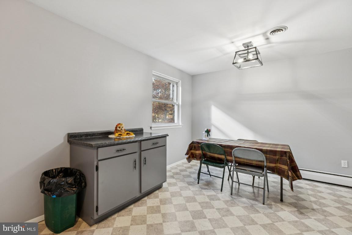 207 Sooy Place Road Tabernacle, NJ 08088 - Photo 8 of 25 a living room with furniture and a table