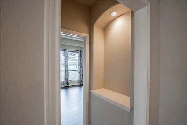 a view of a hallway with closet