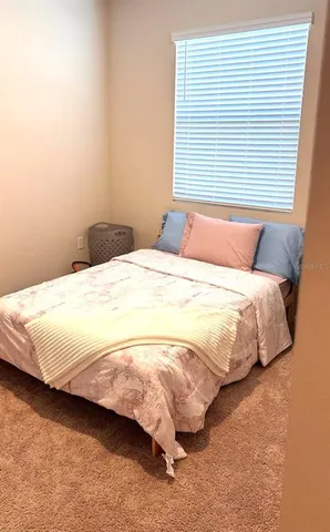 a room with furniture and a piano