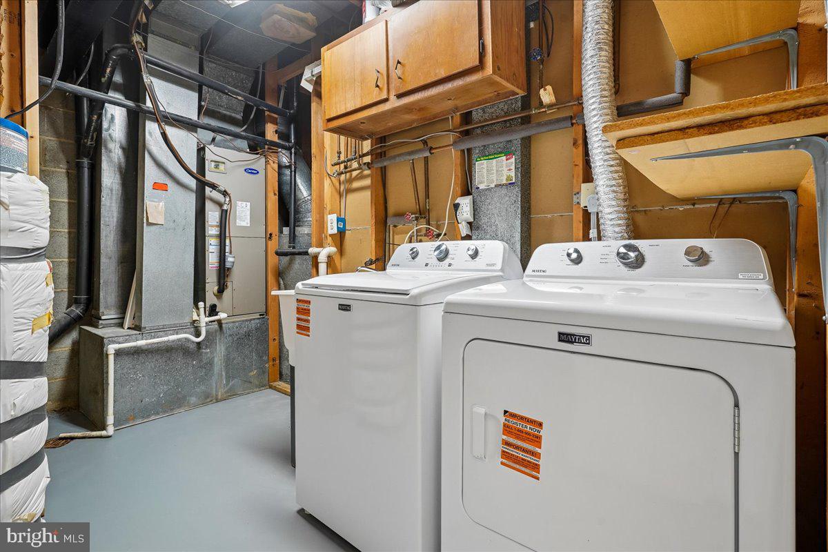 9752 High Water Court Burke, VA 22015 - Photo 20 of 25 a utility room with dryer and washer