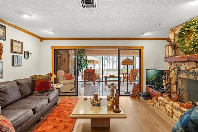 a bed room with furniture and wooden floor