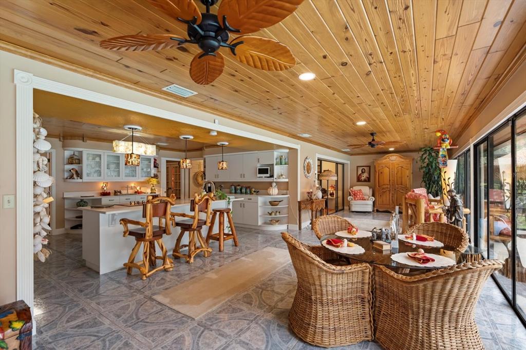 4345 Corley Island Road Leesburg, FL 34748 - Photo 28 of 73 a living room with furniture and a large window