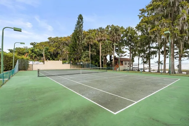 a view of balcony with wooden floor
