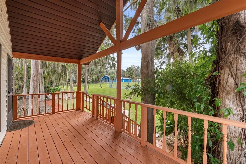 4345 Corley Island Road Leesburg, FL 34748 - Photo 58 of 73 a view of balcony with wooden floor