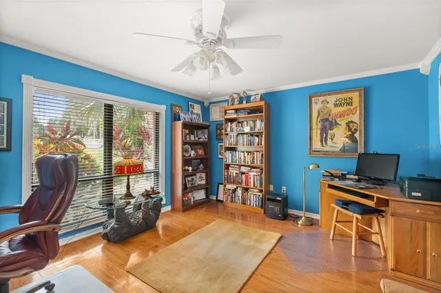 a bedroom with furniture and a window