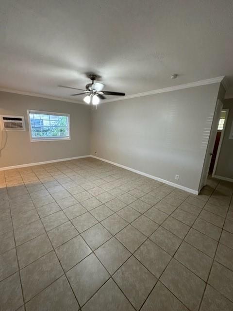 3205 Northeast 9th Street, Unit 4 Pompano Beach, FL 33062 - Photo 4 of 11 an empty room with windows and ceiling fan