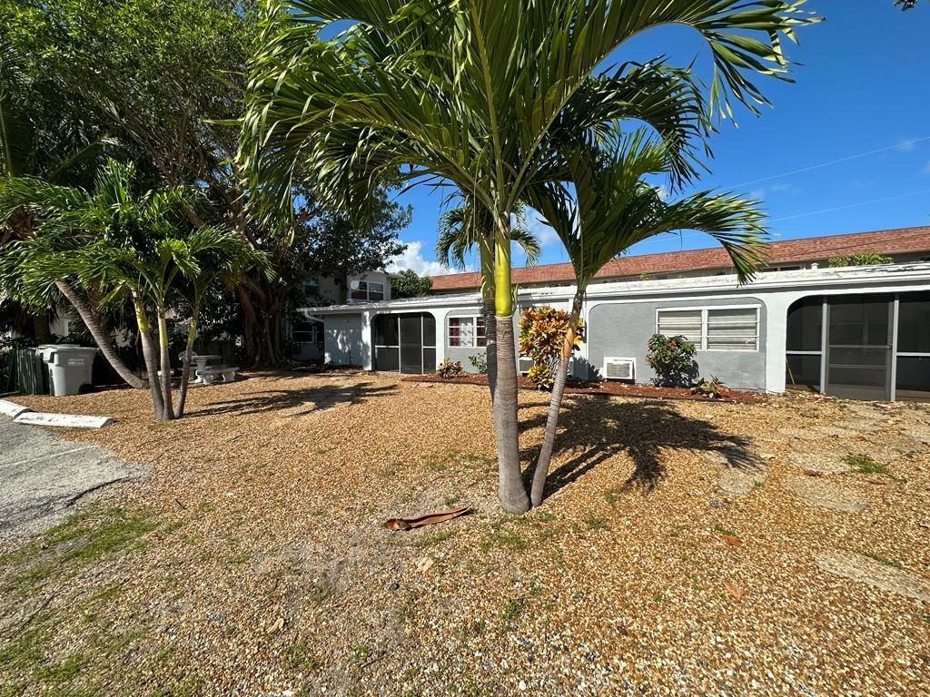 3205 Northeast 9th Street, Unit 4 Pompano Beach, FL 33062 - Photo 7 of 11 a view of a house with a patio