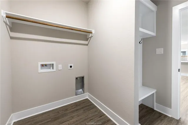 a view of hallway with wooden floor