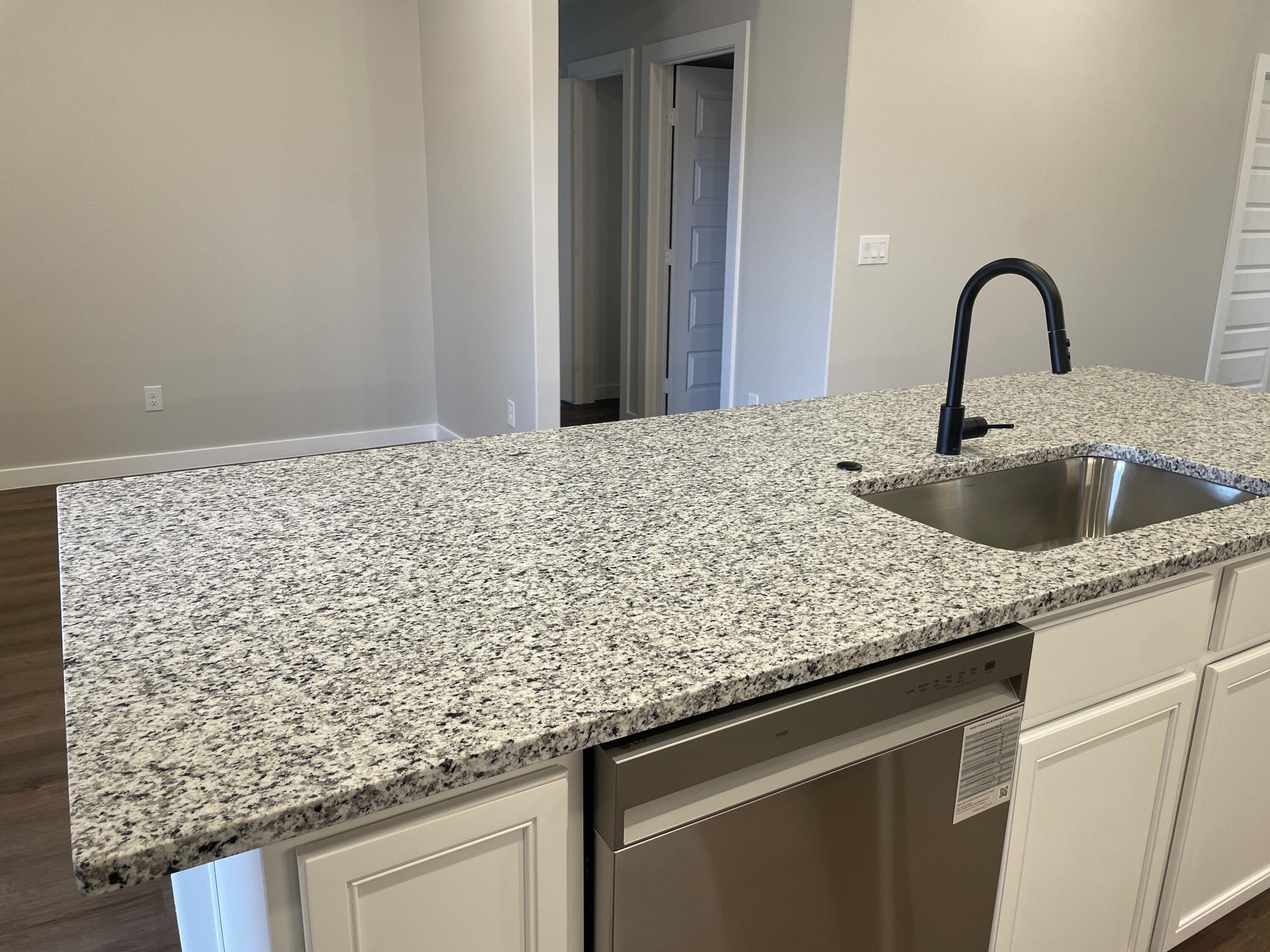 7450 29th Street Lubbock, TX 79407 - Photo 11 of 32 a close view of sink and tap