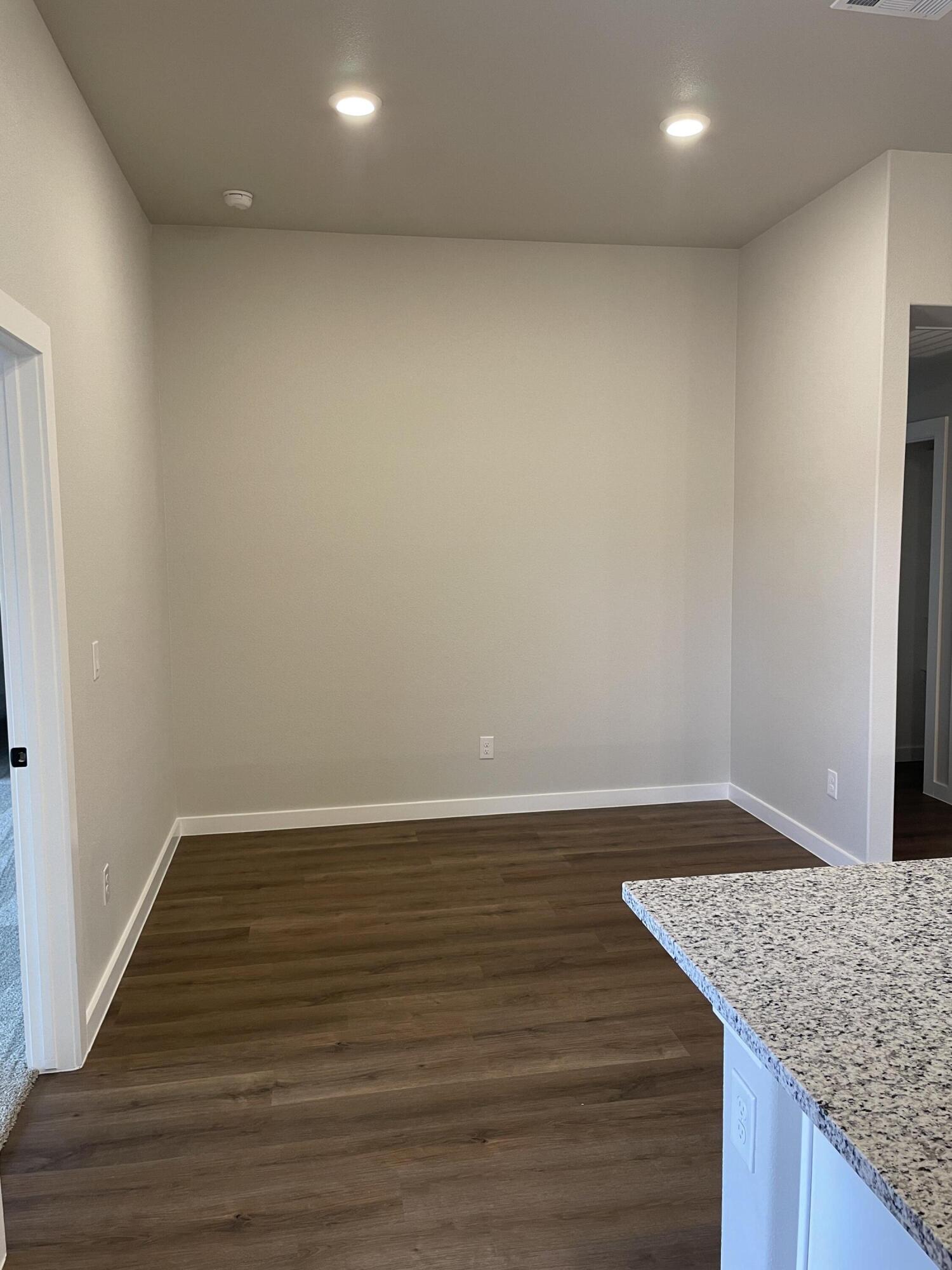 7450 29th Street Lubbock, TX 79407 - Photo 13 of 32 a view of wooden floor and staircase