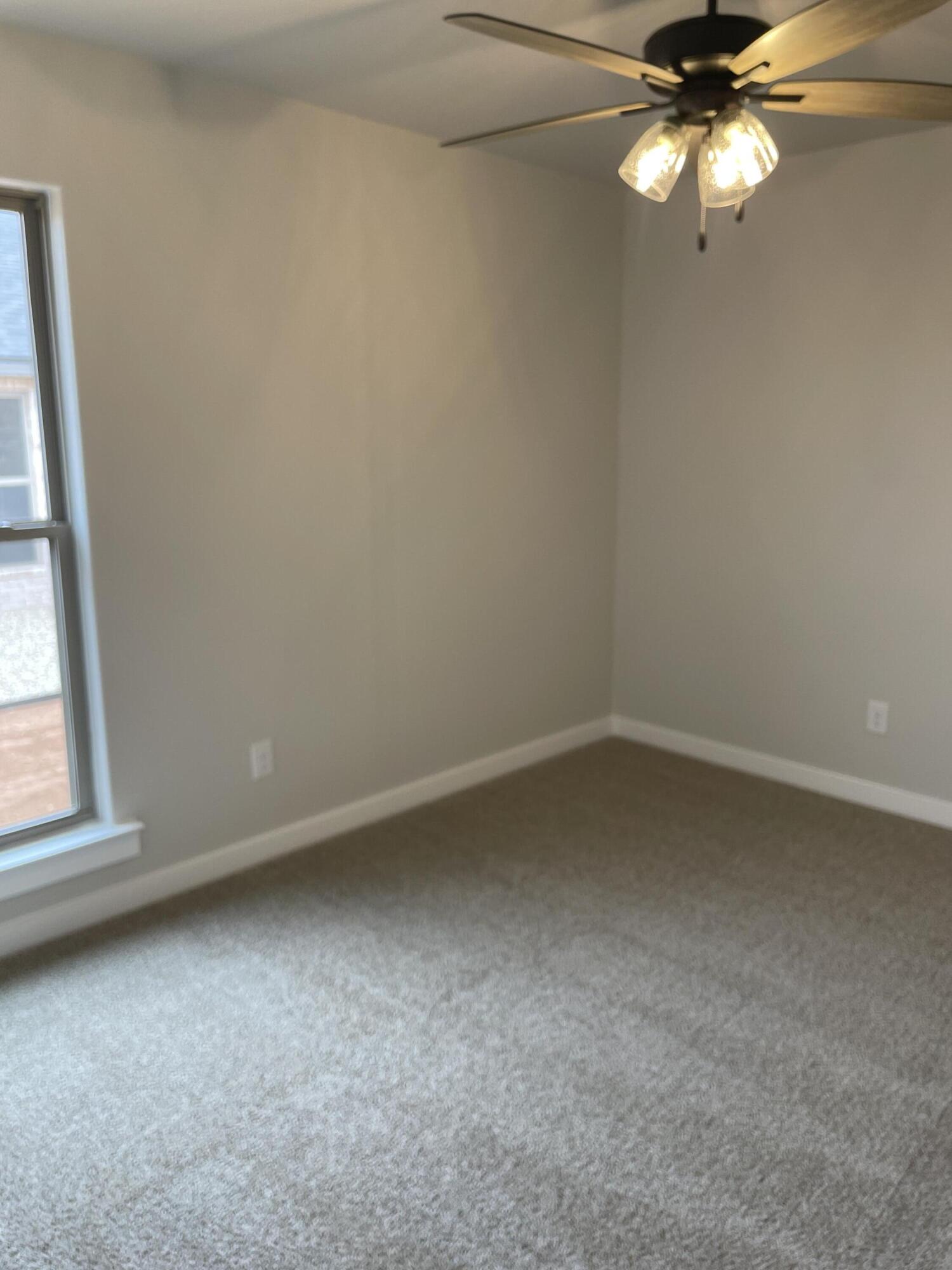 7450 29th Street Lubbock, TX 79407 - Photo 22 of 32 an empty room with a window