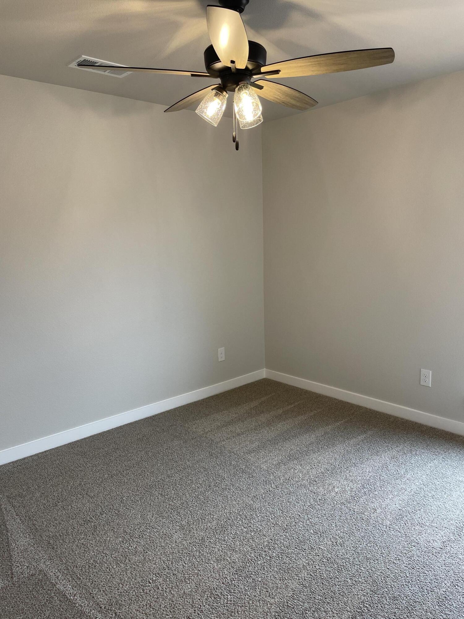 7450 29th Street Lubbock, TX 79407 - Photo 24 of 32 a view of a small space with a fan