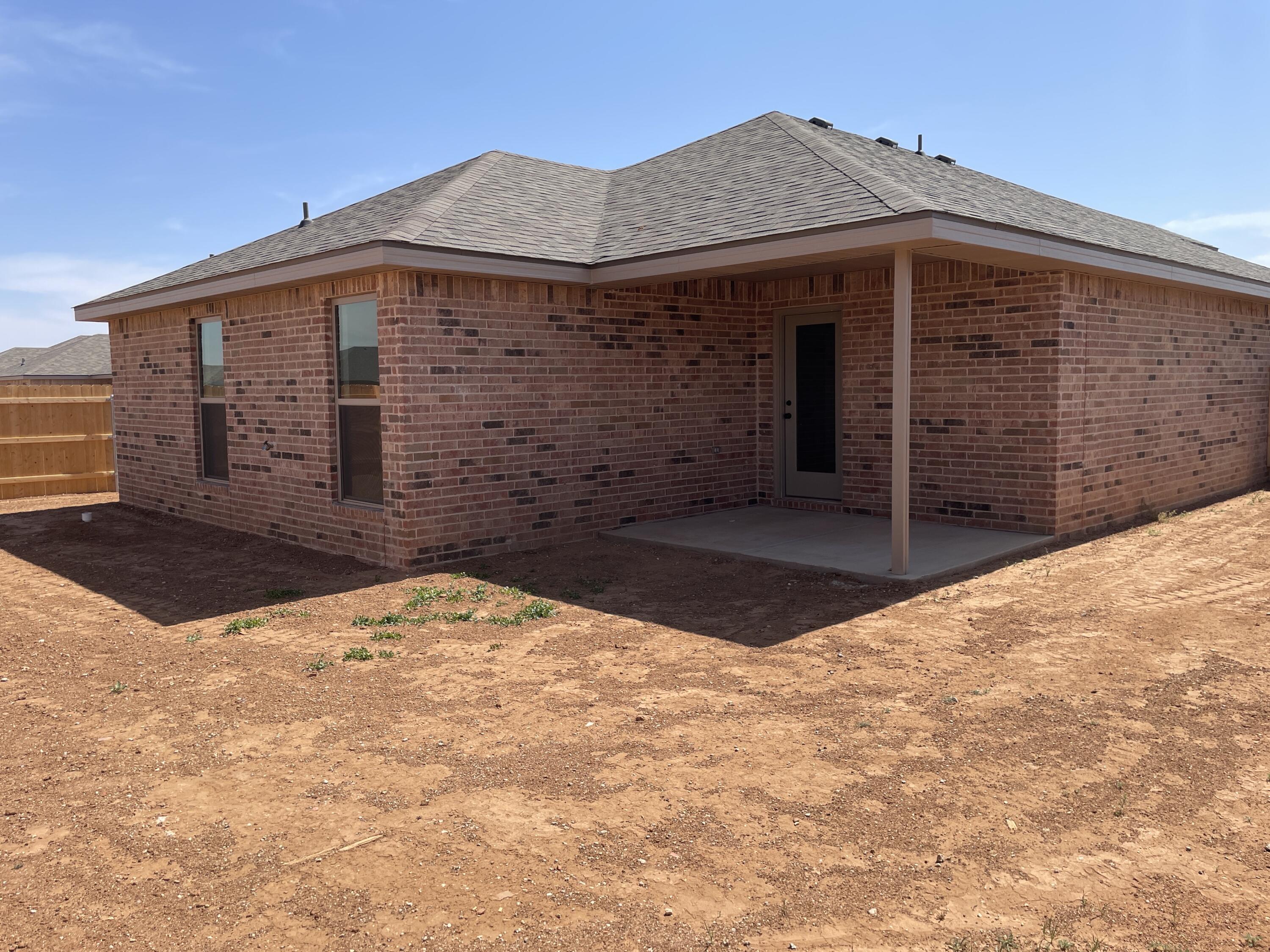 7450 29th Street Lubbock, TX 79407 - Photo 26 of 32 a view of backyard of house