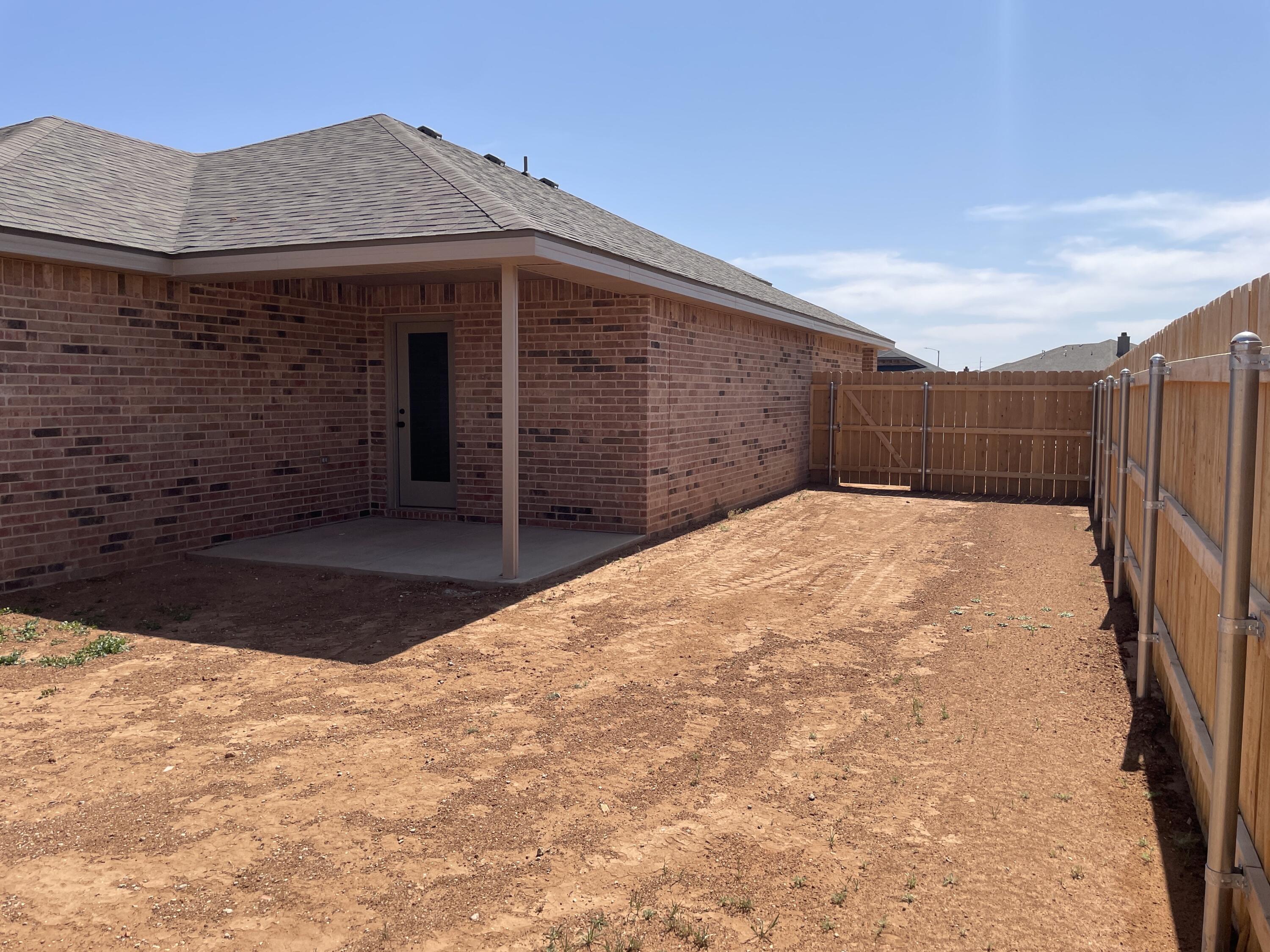 7450 29th Street Lubbock, TX 79407 - Photo 32 of 32 a view of a backyard