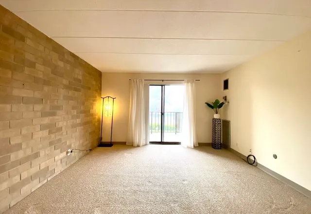 a view of a livingroom with a garage