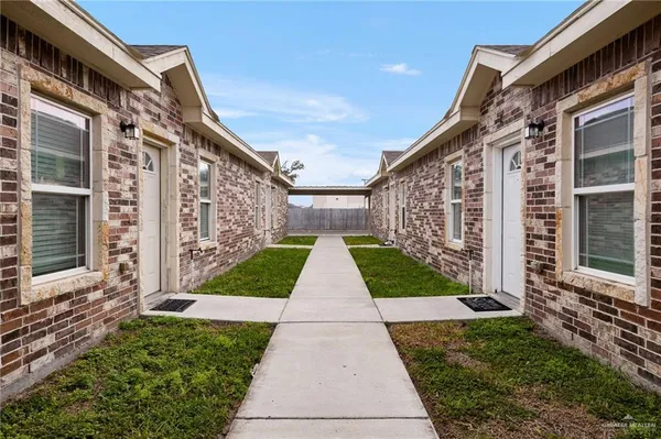 a view of backyard with green space