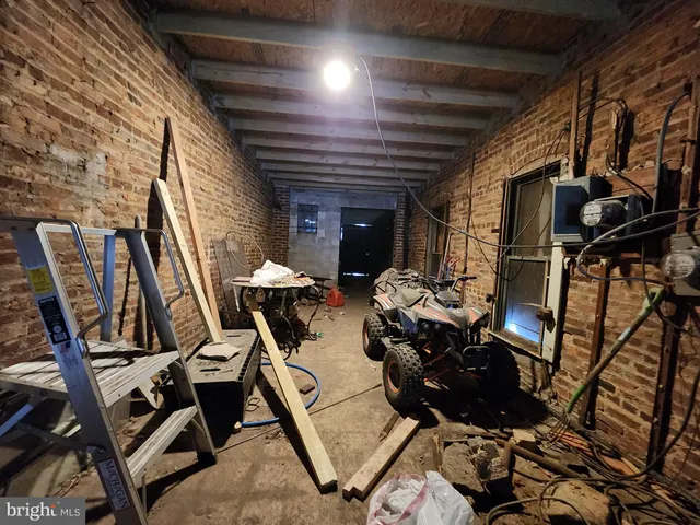 a room with lots of chairs and couches