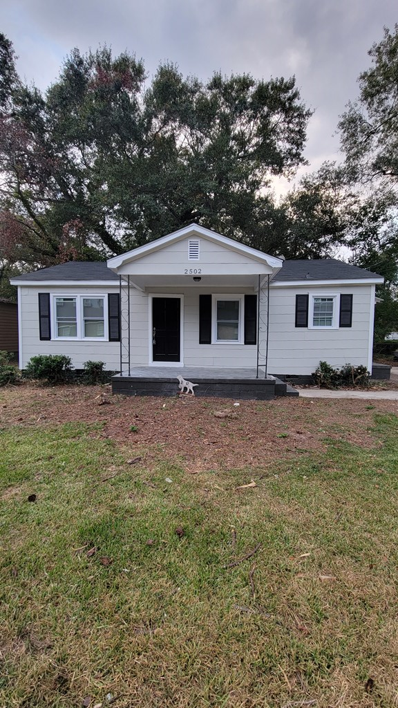 2502 Heard Street Columbus, GA 31906 - Photo 2 of 4 a front view of house with yard and green space