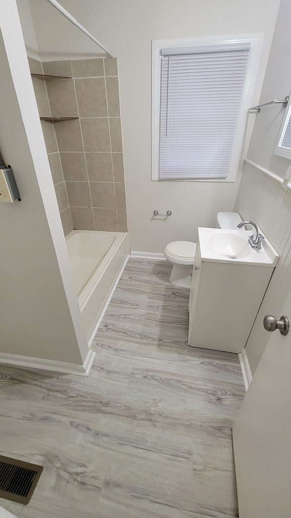 2502 Heard Street Columbus, GA 31906 - Photo 4 of 4 a bathroom with a sink a toilet and shower