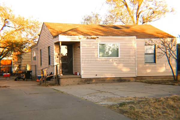 a view of a house with a patio