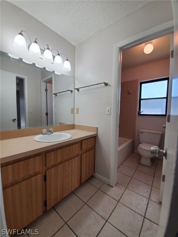 7510-7512 Love Road Fort Myers, FL 33967 - Photo 14 of 16 a bathroom with a double vanity sink and a mirror