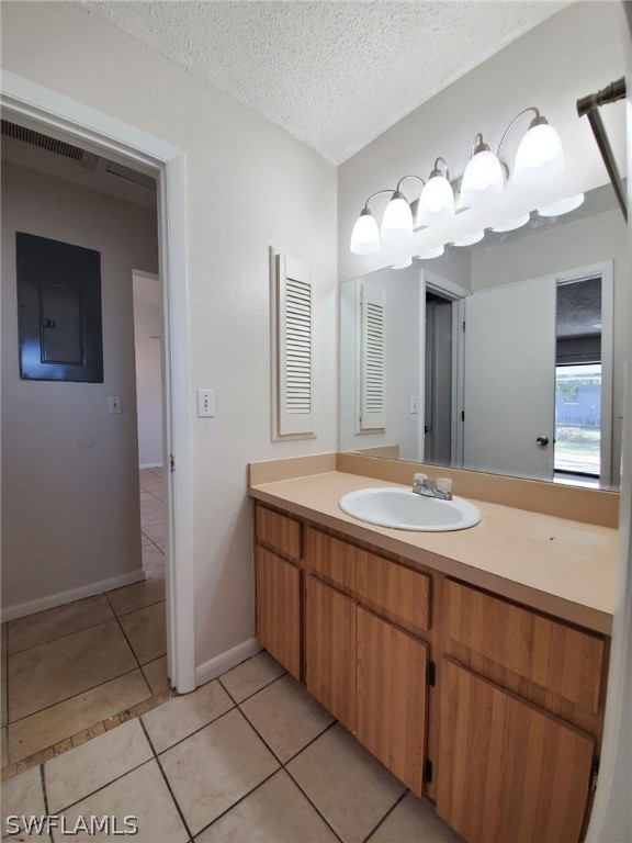 7510-7512 Love Road Fort Myers, FL 33967 - Photo 15 of 16 a bathroom with a sink and a mirror