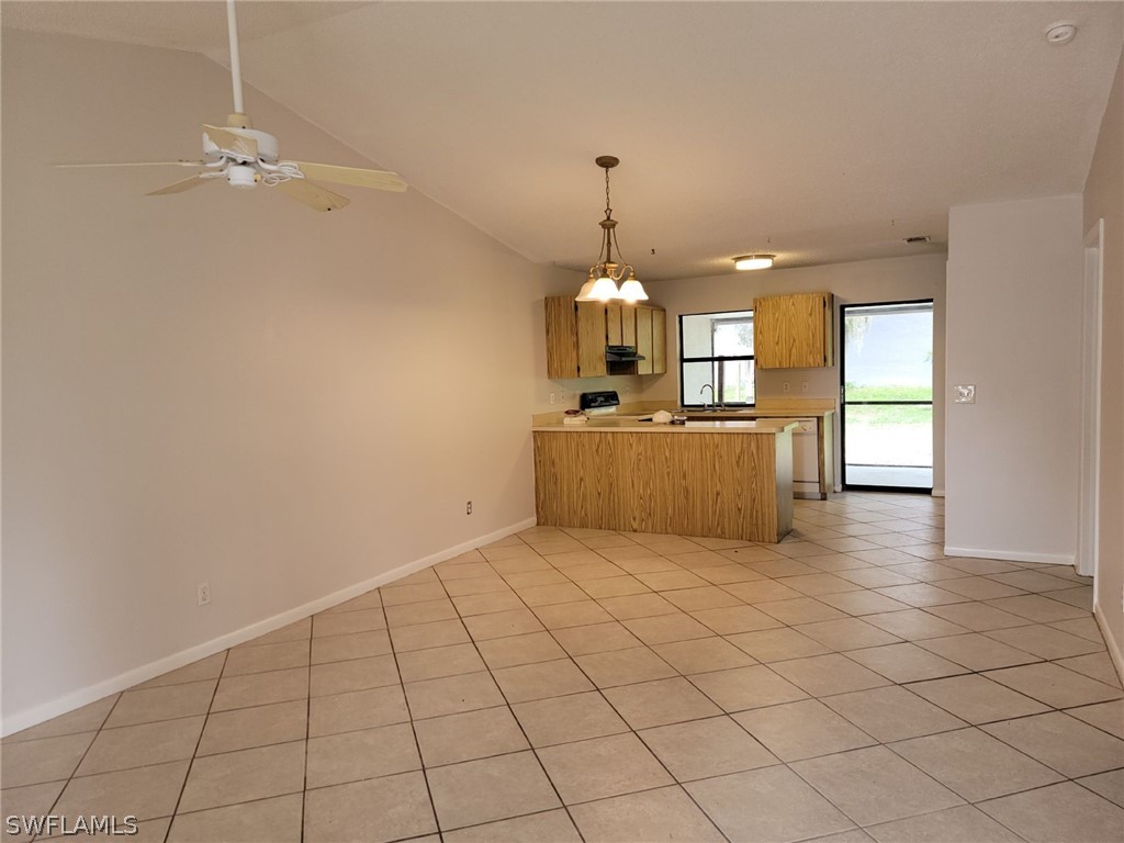 7510-7512 Love Road Fort Myers, FL 33967 - Photo 2 of 16 a view of a kitchen with a sink cabinets and window