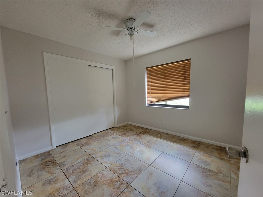 7510-7512 Love Road Fort Myers, FL 33967 - Photo 8 of 16 a view of an empty room with a window