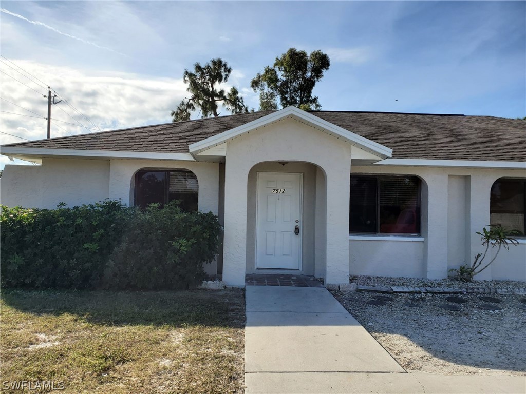 7510-7512 Love Road Fort Myers, FL 33967 - Photo 10 of 16 a front view of a house