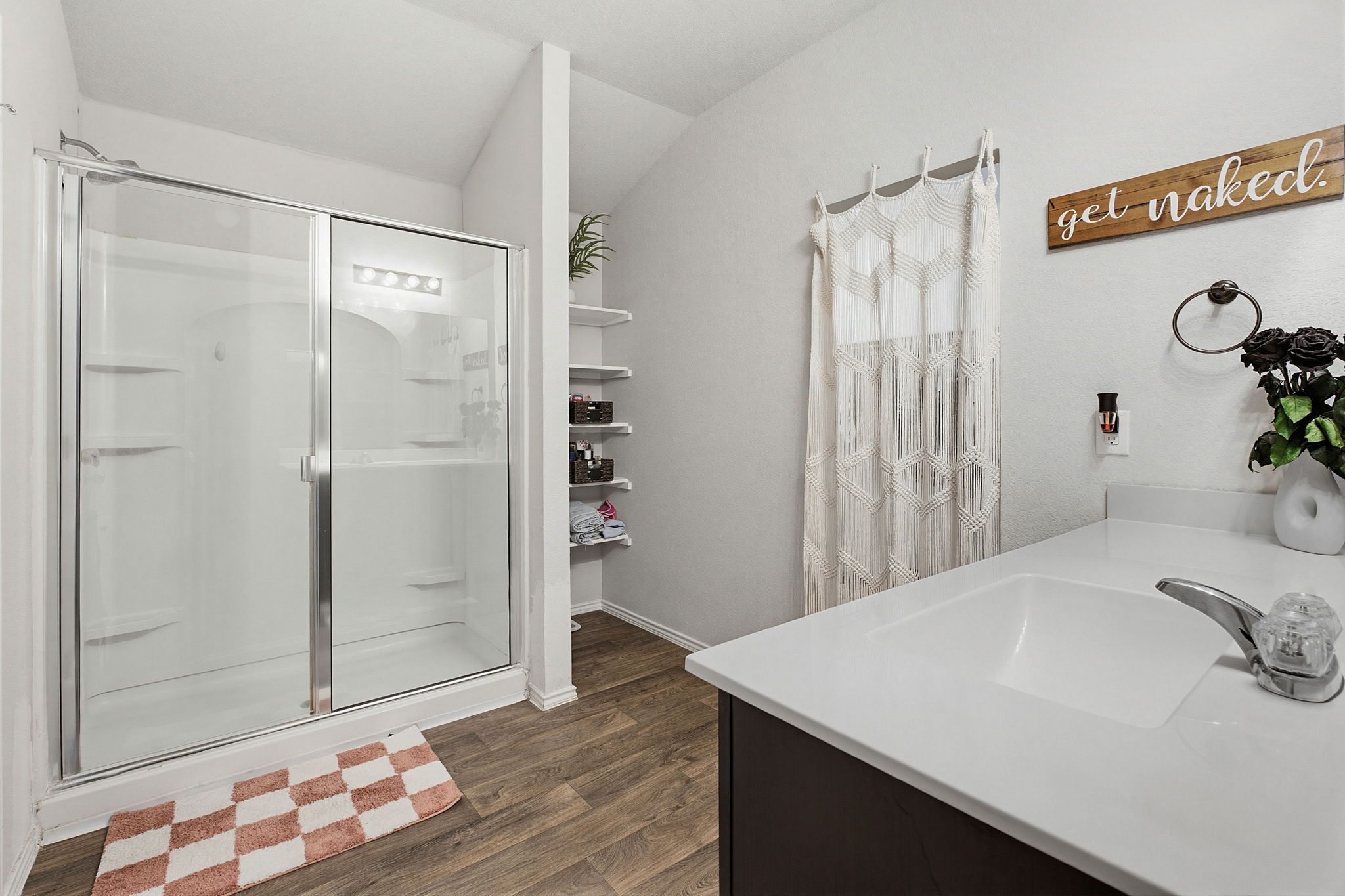 5805 Brampton Lane Austin, TX 78724 - Photo 9 of 17 Bathroom featuring vanity, a shower stall, and dark wood-type flooring