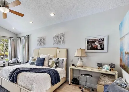 a view of living room with balcony and furniture