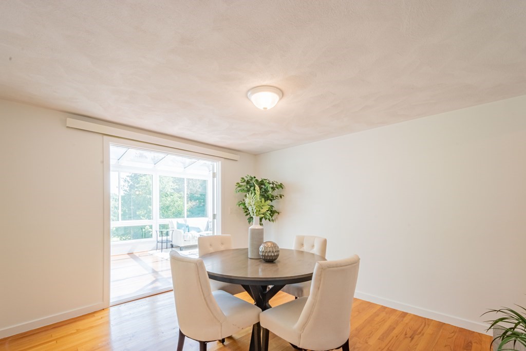 188 Spring Street Lexington, MA 02421 - Photo 6 of 42 a dining room with furniture and wooden floor