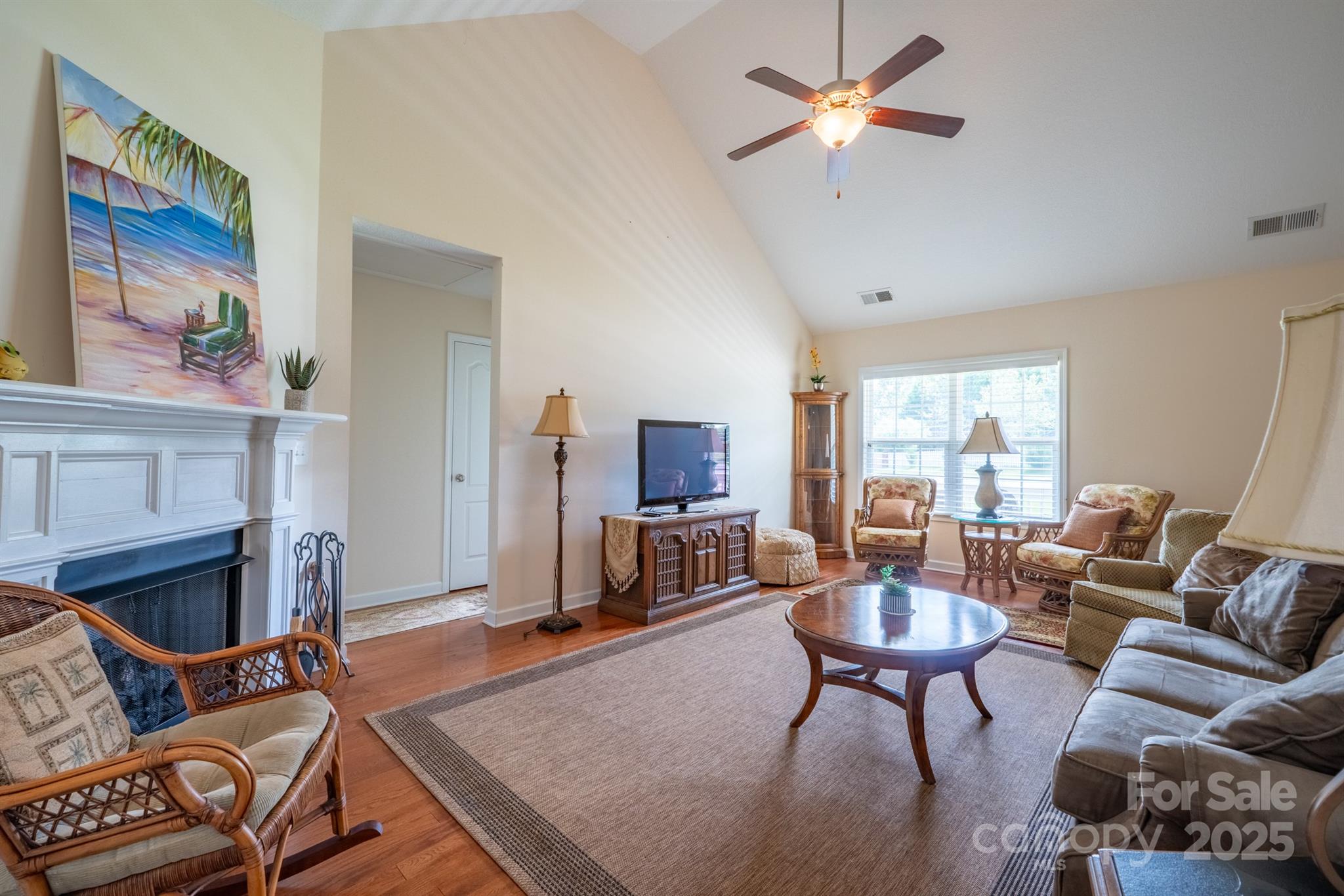 1812 Sam Smith Road Fort Mill, SC 29708 - Photo 11 of 43 a living room with furniture a fireplace and a flat screen tv