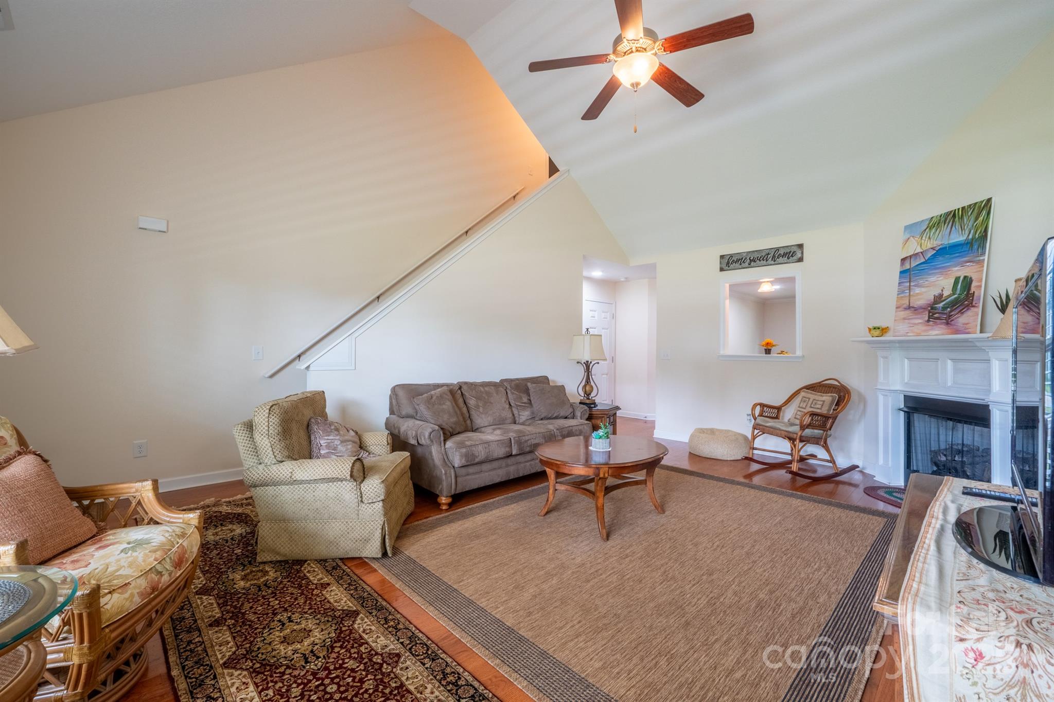 1812 Sam Smith Road Fort Mill, SC 29708 - Photo 12 of 43 a living room with furniture and a fireplace