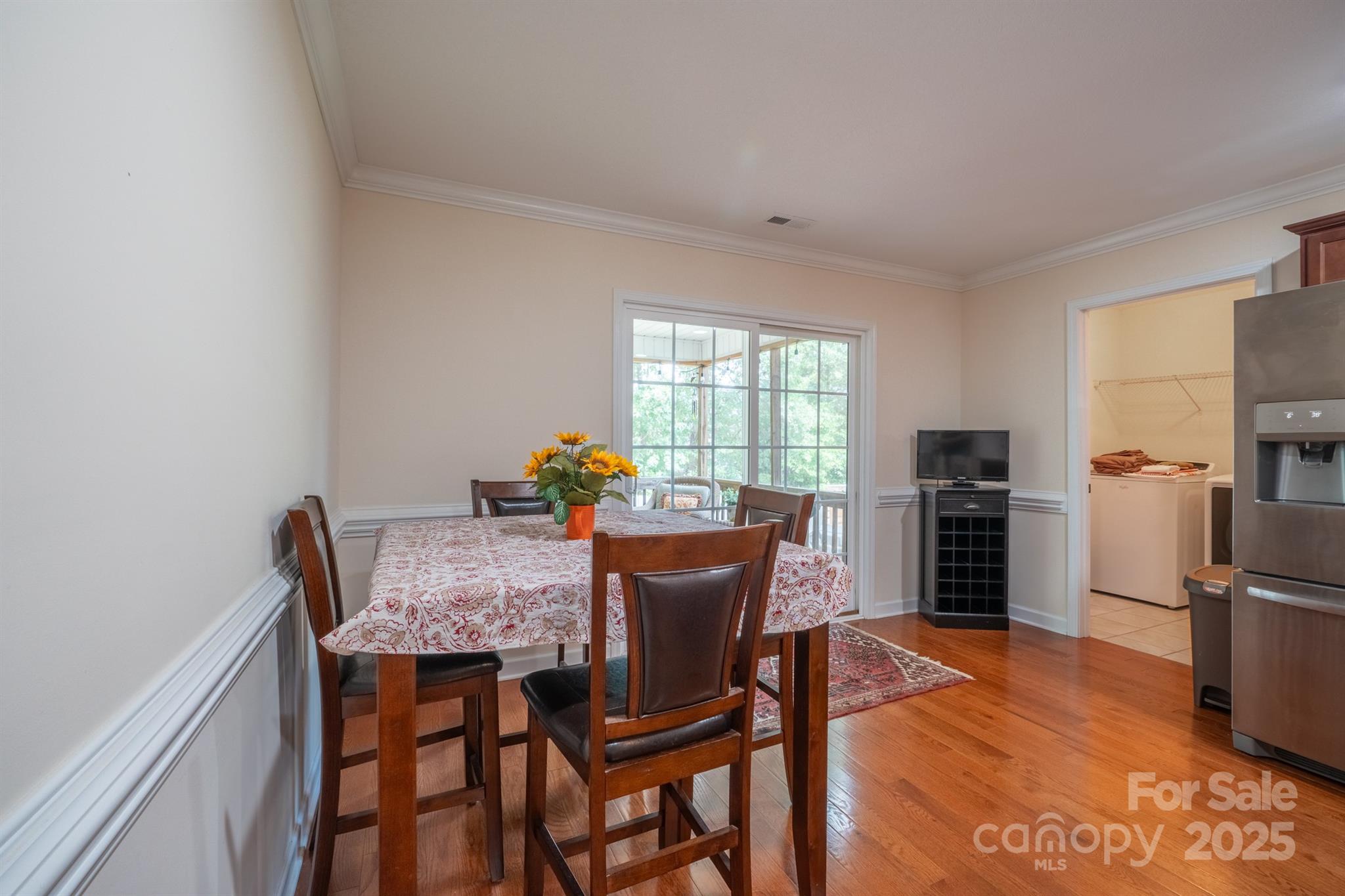 1812 Sam Smith Road Fort Mill, SC 29708 - Photo 19 of 43 a view of a dining room with furniture and a window