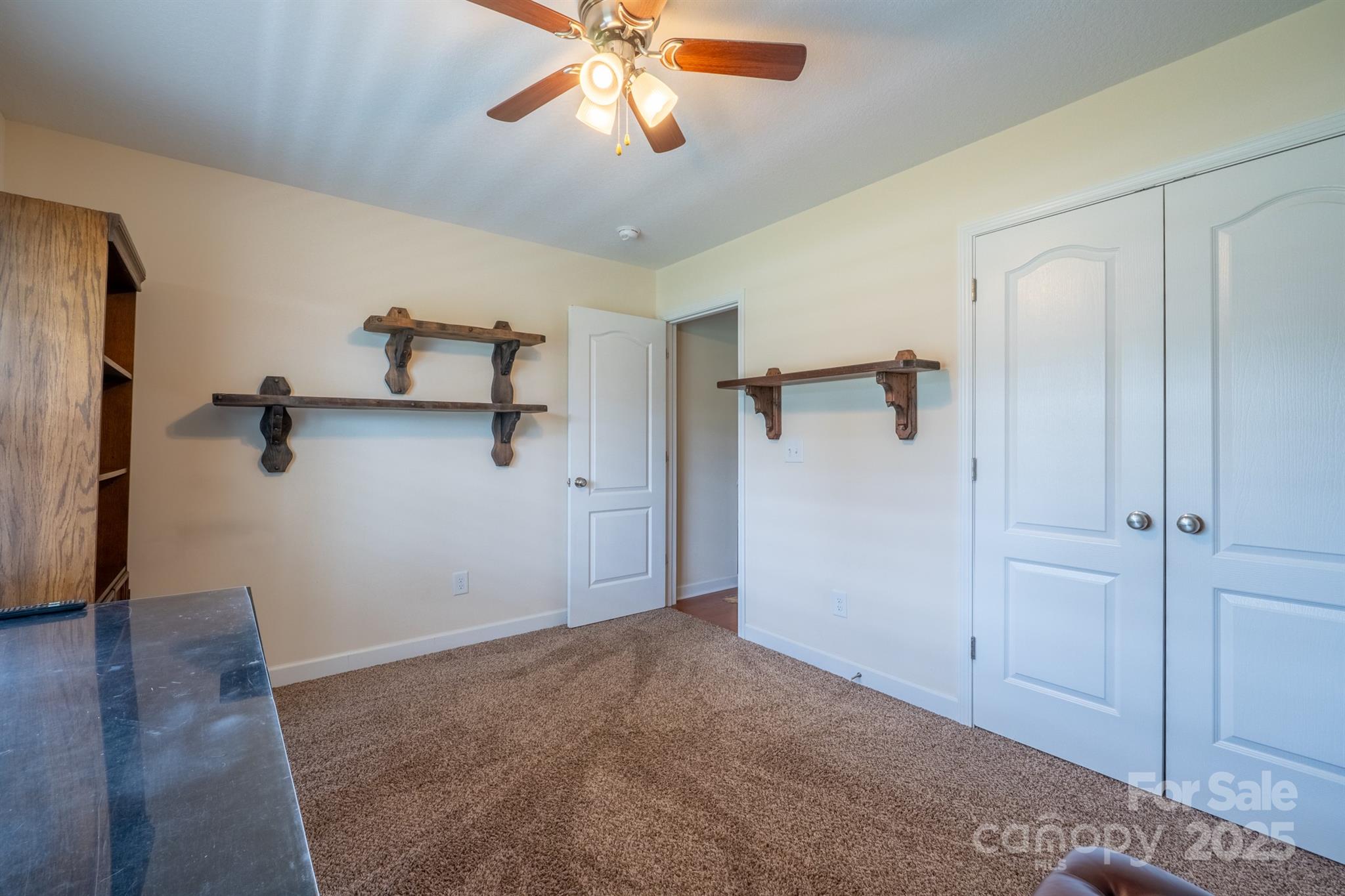 1812 Sam Smith Road Fort Mill, SC 29708 - Photo 30 of 43 a view of a livingroom with a chandelier fan