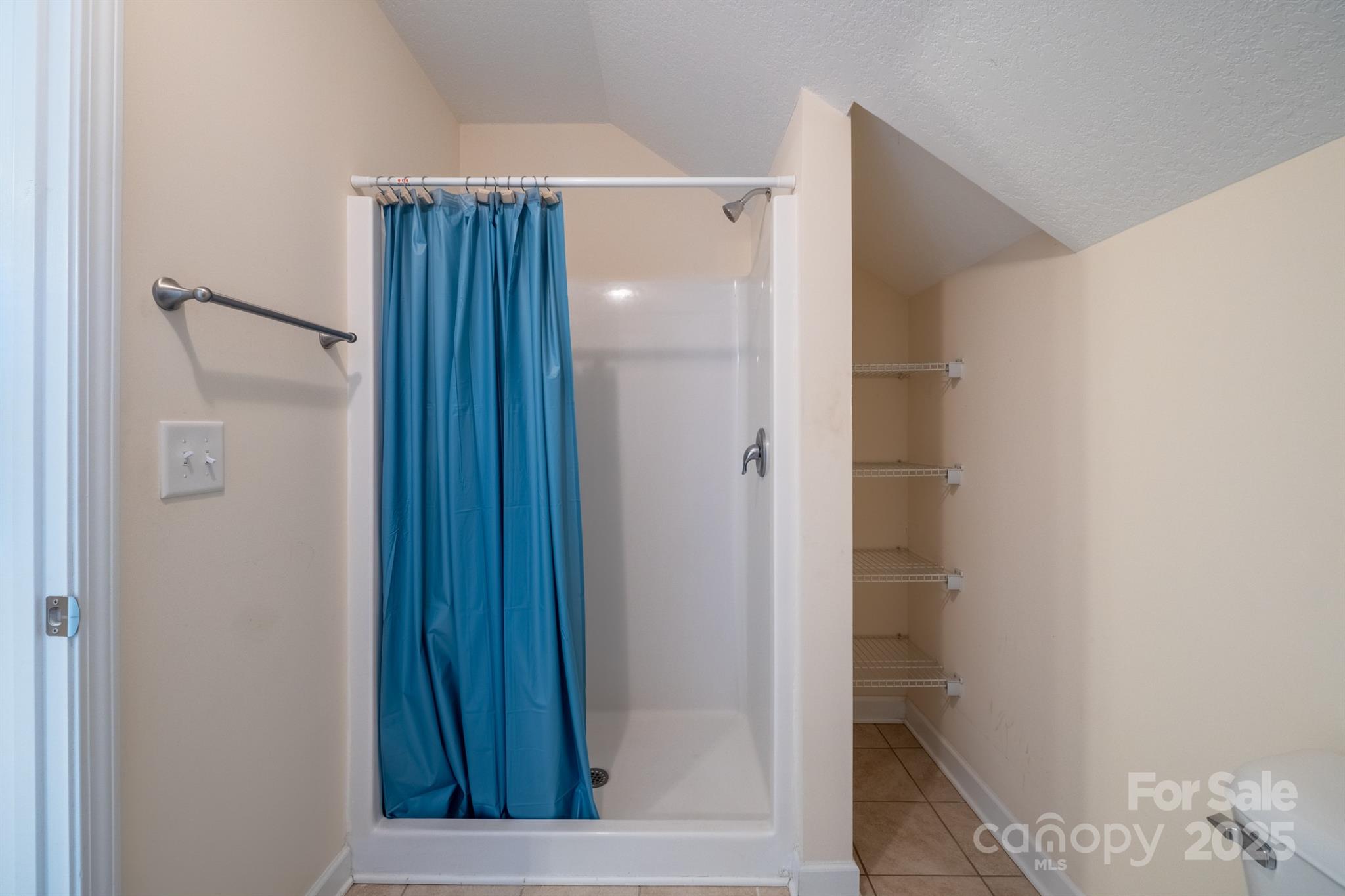 1812 Sam Smith Road Fort Mill, SC 29708 - Photo 33 of 43 a bathroom with a shower and a sink