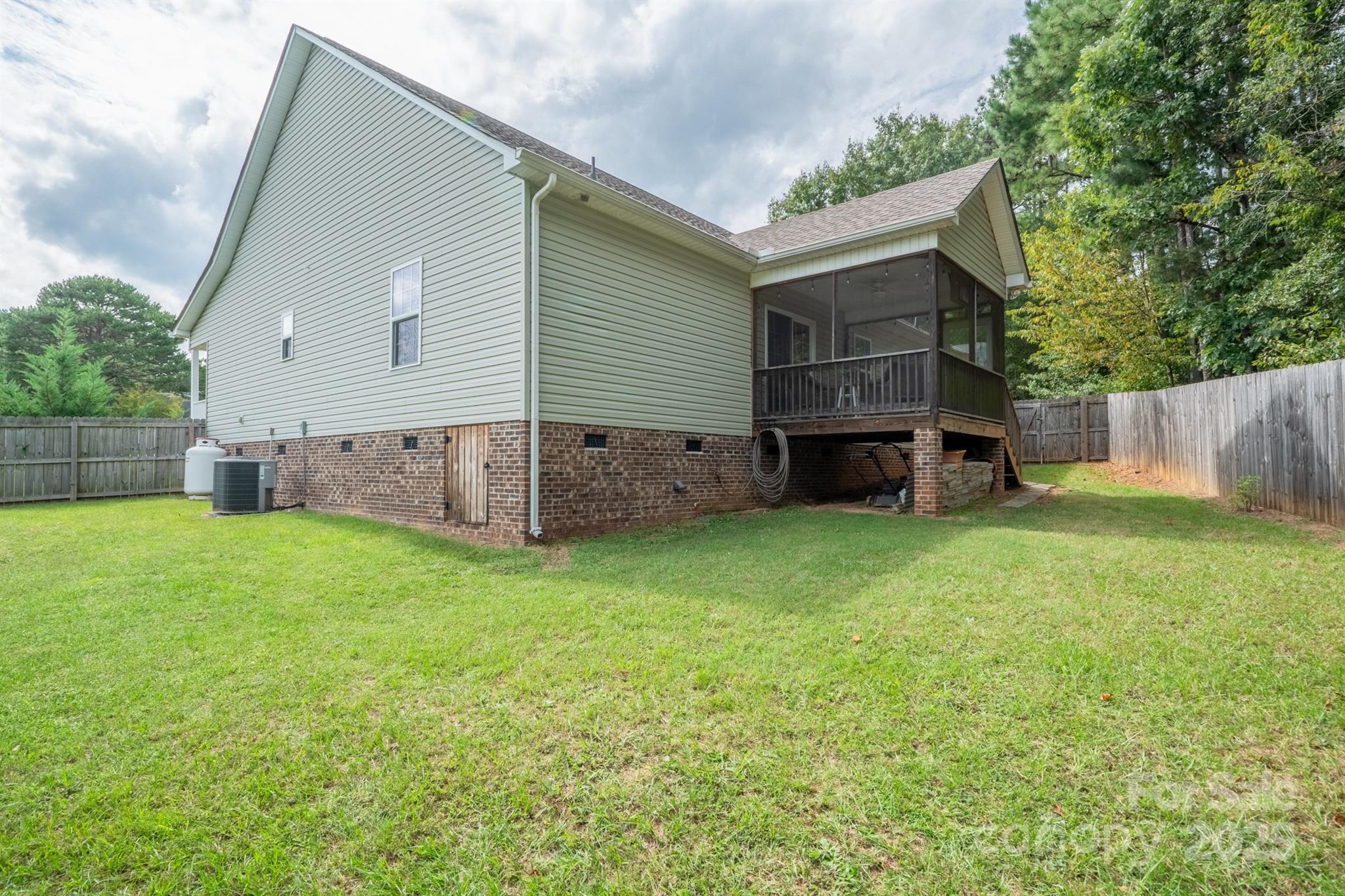 1812 Sam Smith Road Fort Mill, SC 29708 - Photo 37 of 43 a view of a house with backyard and sitting area