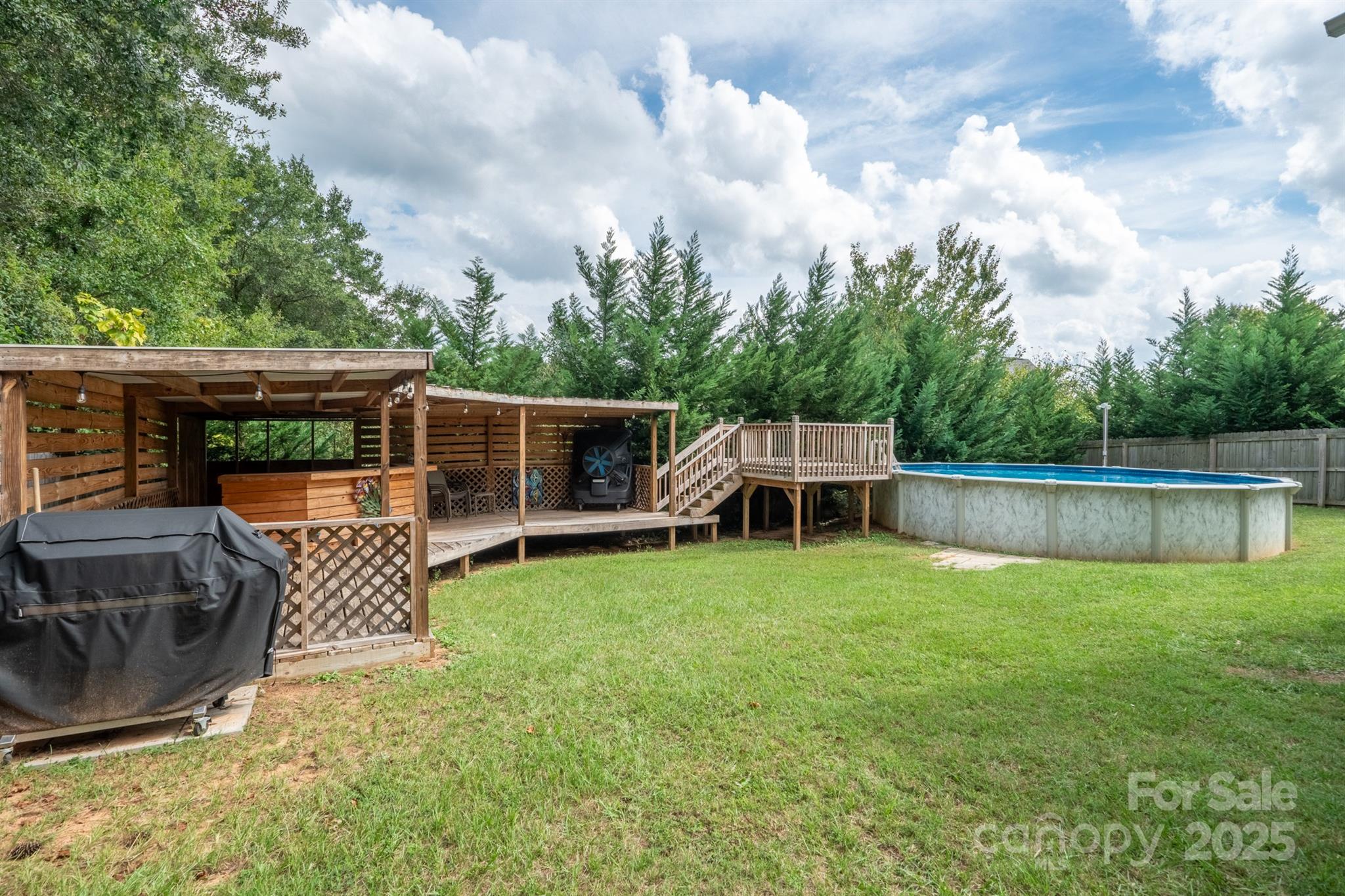 1812 Sam Smith Road Fort Mill, SC 29708 - Photo 38 of 43 a view of a chair and table in the patio