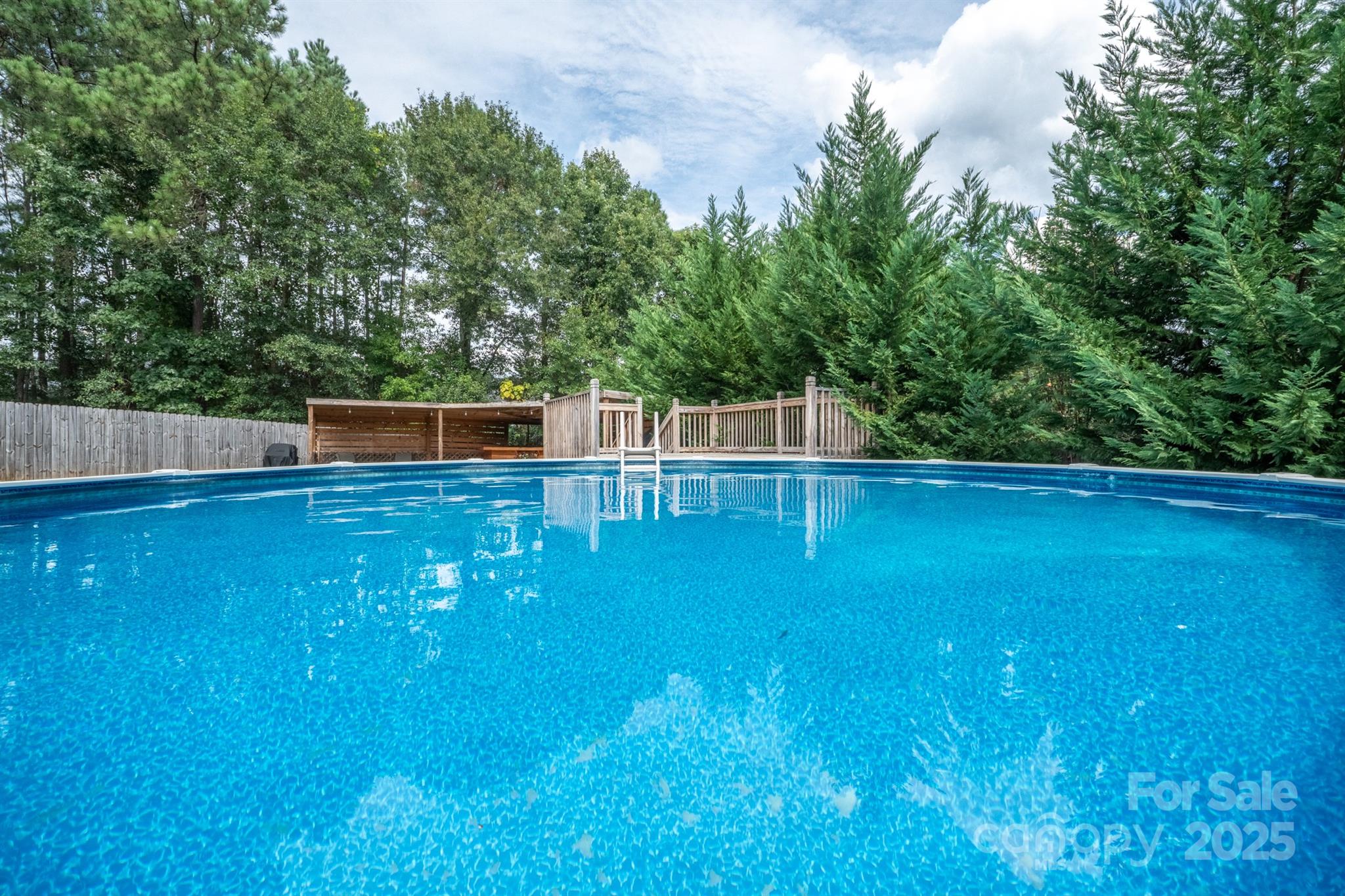 1812 Sam Smith Road Fort Mill, SC 29708 - Photo 4 of 43 a view of a backyard with swimming pool