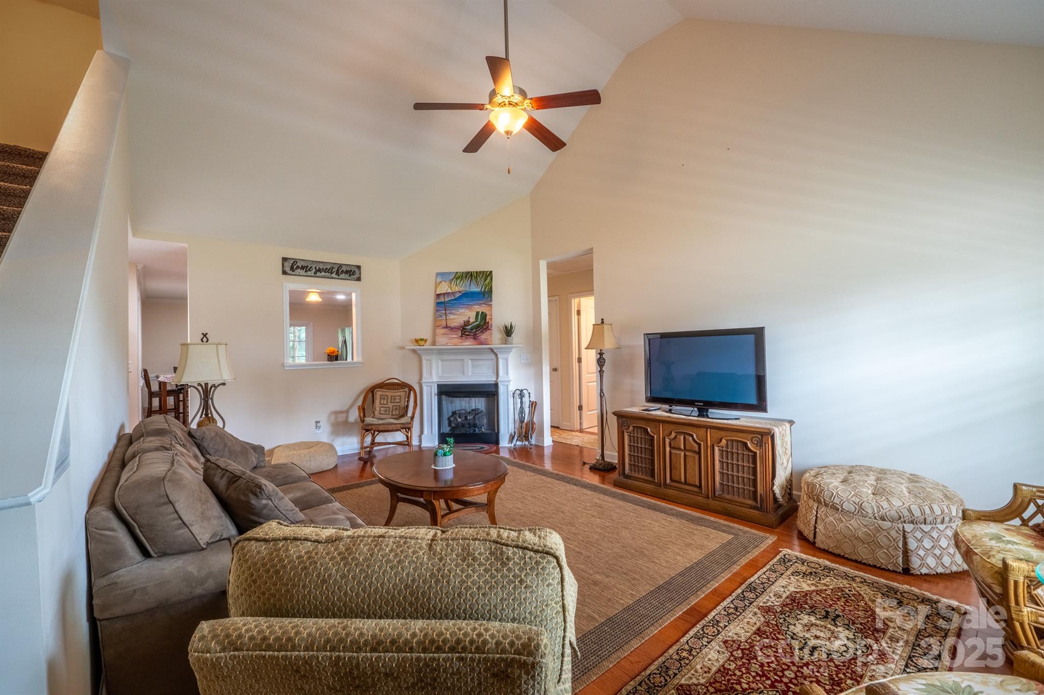 1812 Sam Smith Road Fort Mill, SC 29708 - Photo 10 of 43 a living room with furniture and a flat screen tv