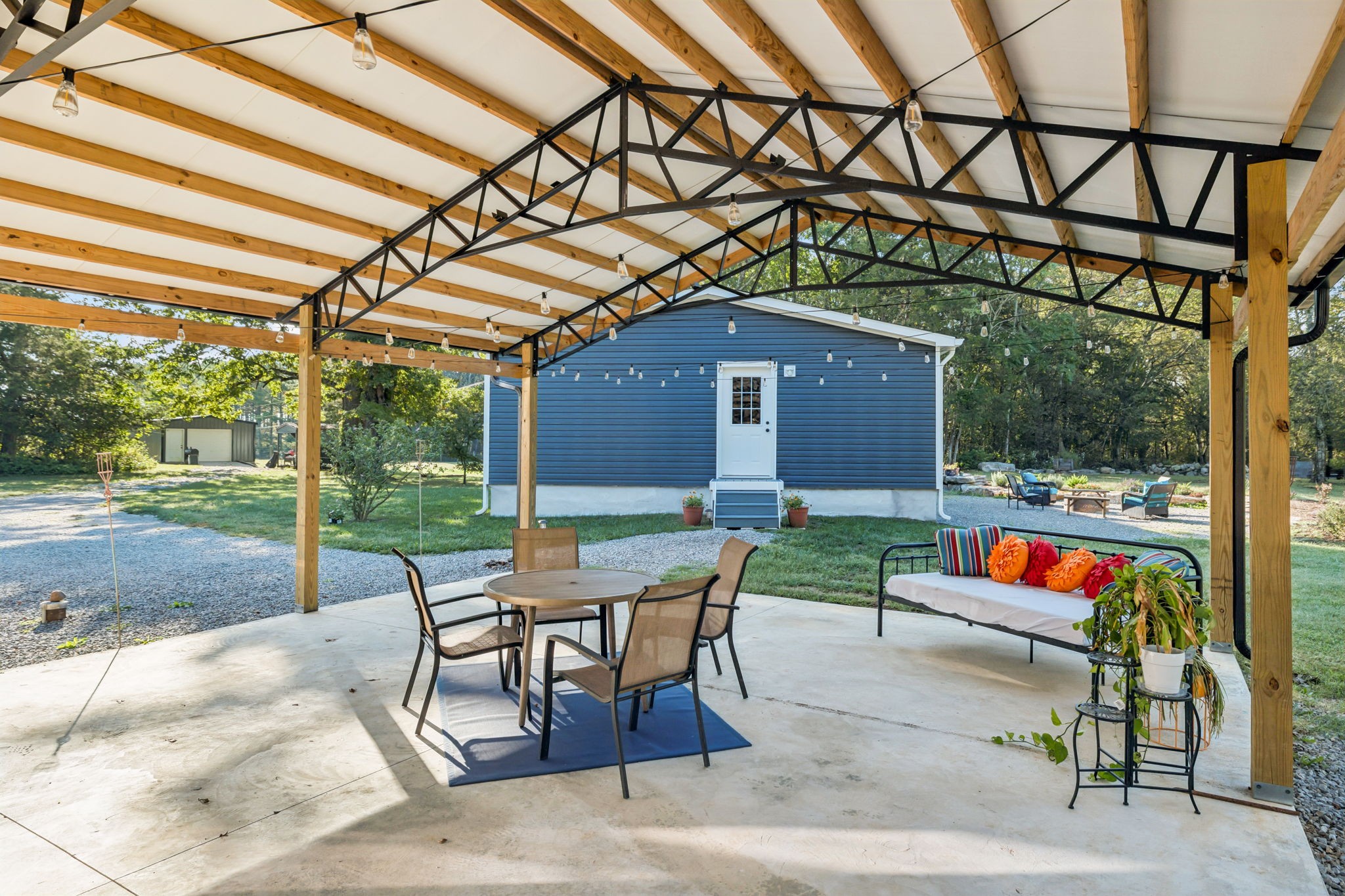 4650 Lunns Store Road Chapel Hill, TN 37034 - Photo 5 of 40 a backyard of a house with outdoor seating