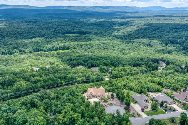 a house view with a backyard space