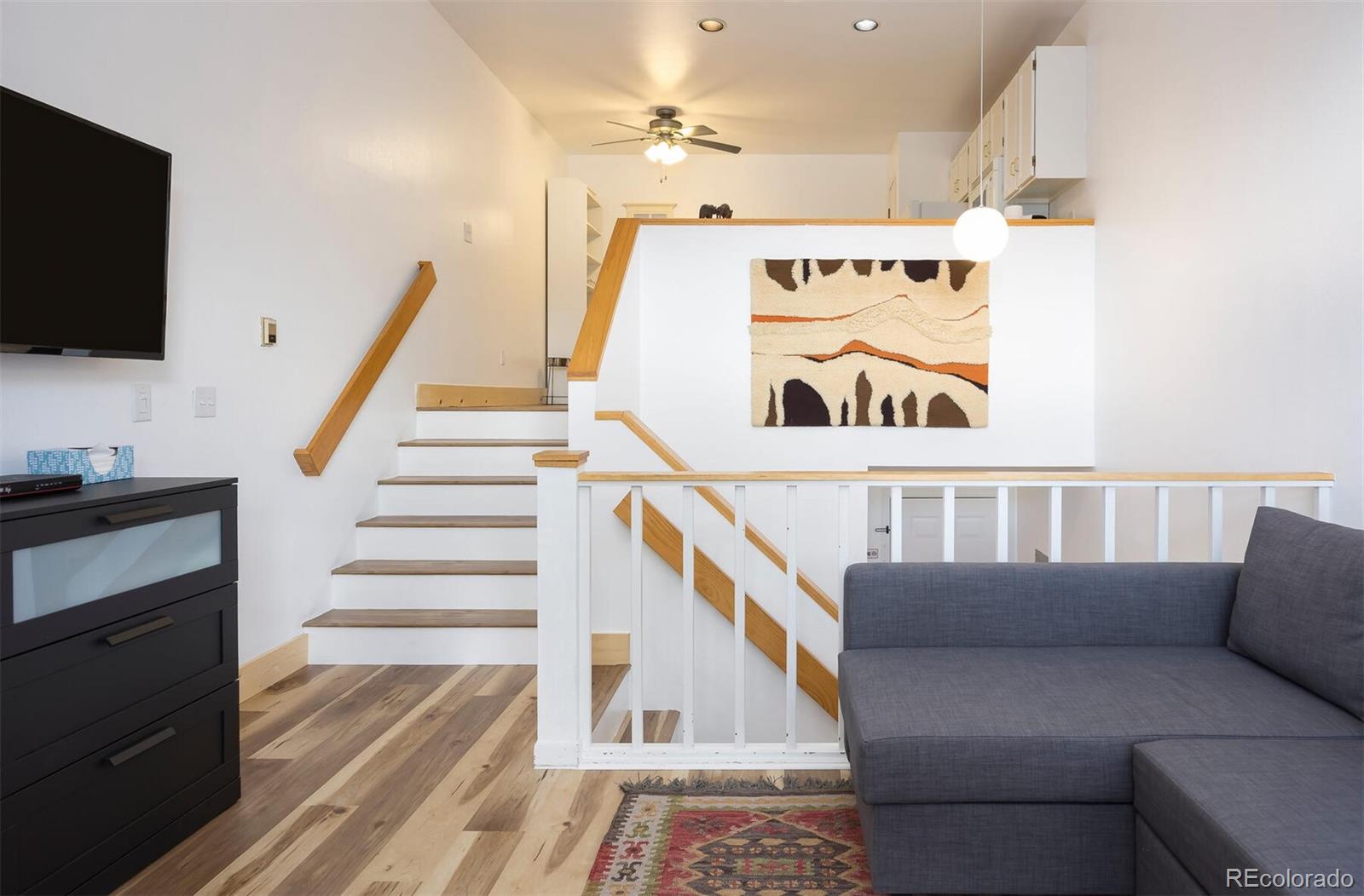 10000 Ryan Gulch Road, Unit 105 Silverthorne, CO 80498 - Photo 6 of 40 a view of entryway and hall with wooden floor