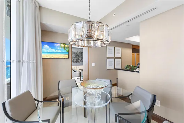 a bedroom with a large bed and a couch